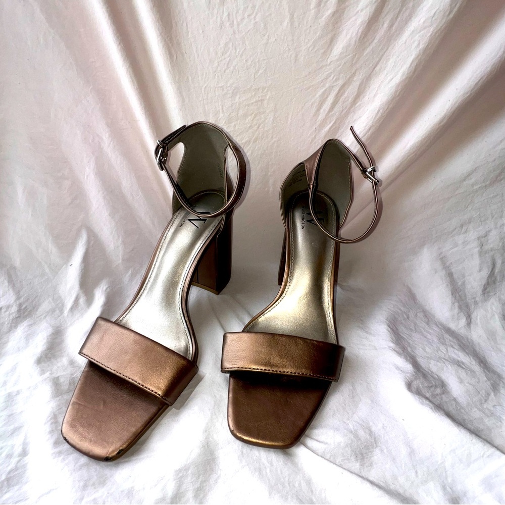 Size 10 heels worn twice for weddings.